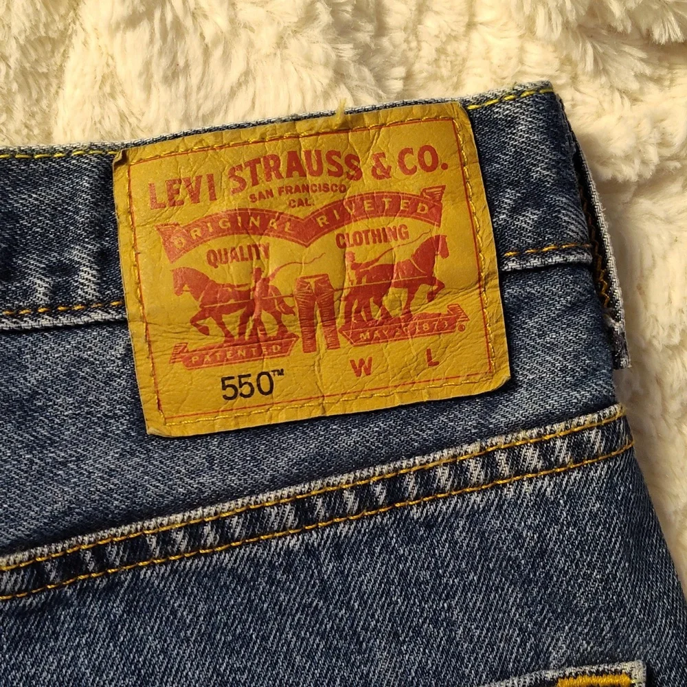 Levi's 550 men's denim blue jeans size 48x30 nwt